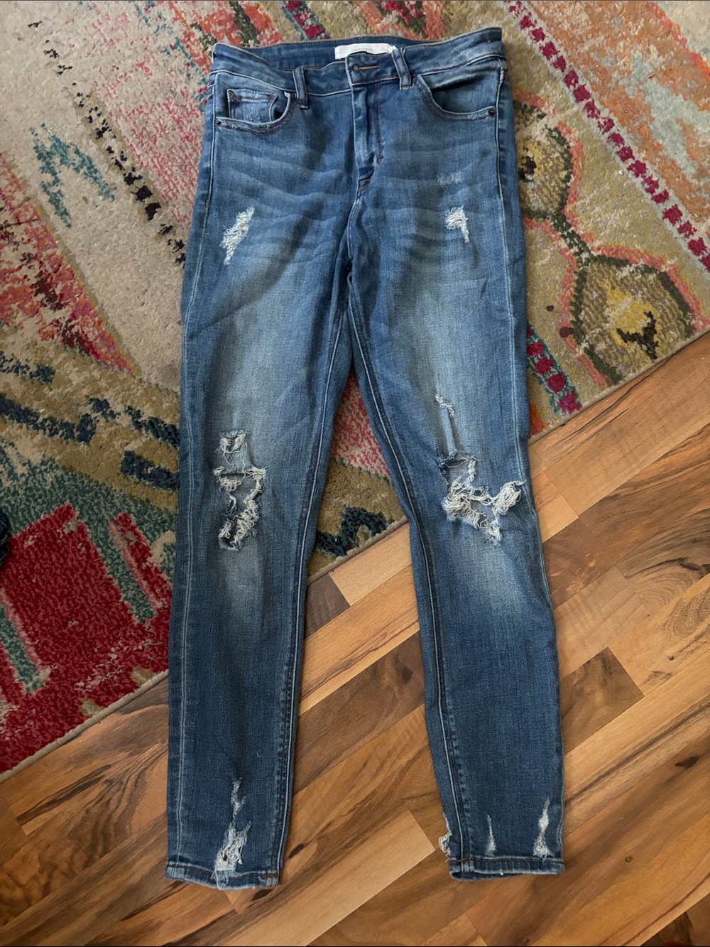Distressed Skinny Jeans in Washed Blue